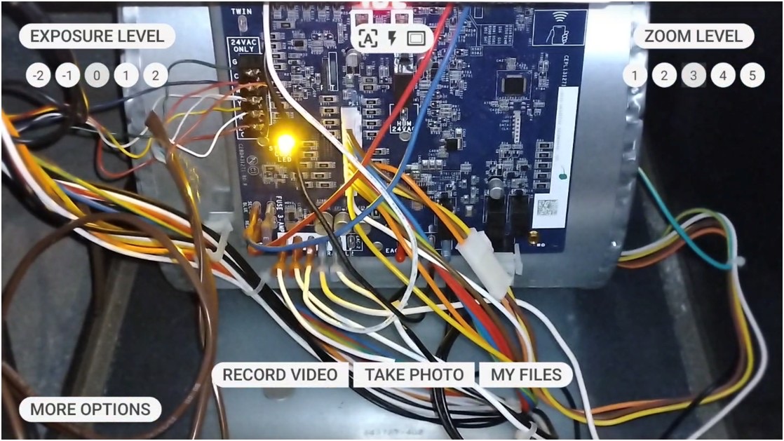 RealWear Arc 3 camera view with exposure and zoom controls for close-up inspection