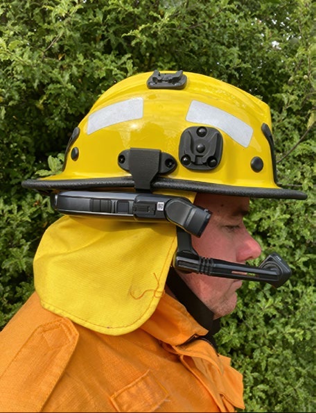 RealWear Navigator 520 mounted on a New Zealand wildfire helmet using custom-fabricated clips